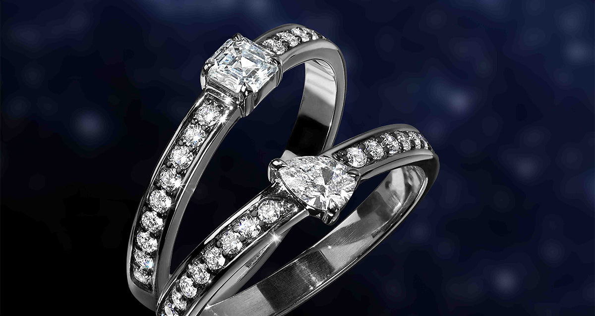 Two Canadian-made diamond engagement rings in 18K white gold. One Asscher cut and one pear cut diamond with pavé bands.