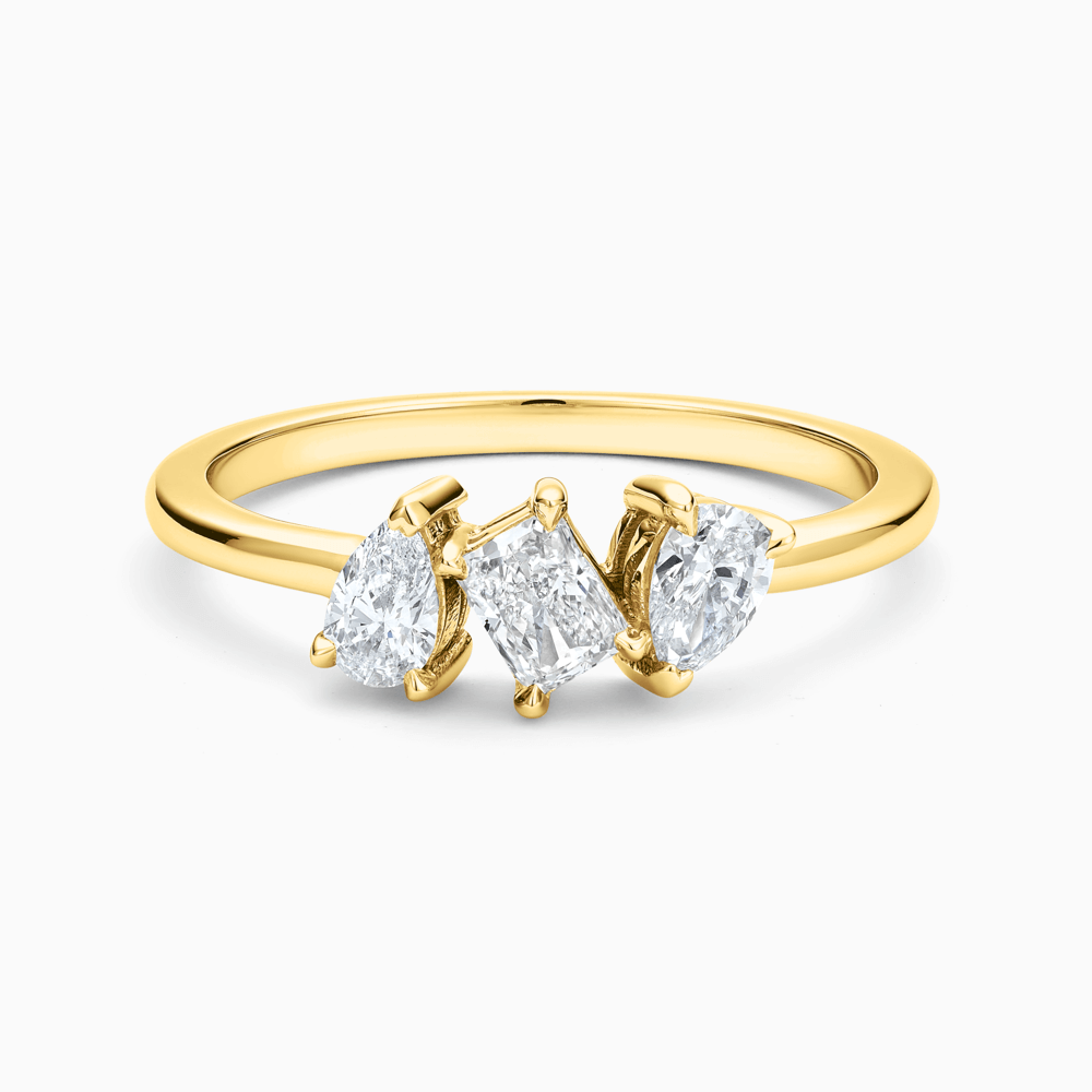 The Ecksand Three-Stone Pear and Radiant-Cut Diamond Ring shown with Lab-grown 0.30 ctw, VS2+/ F+ in 14k Yellow Gold