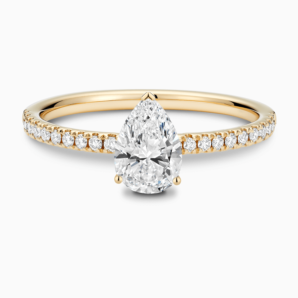 The Ecksand Basket-Setting Diamond Engagement Ring with Diamond Bridge shown with Pear in 18k Yellow Gold