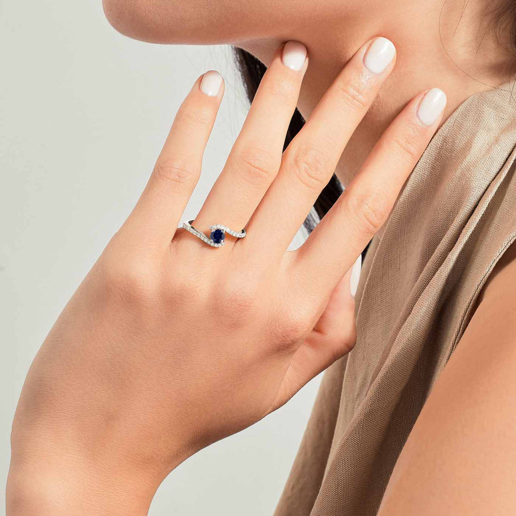 The Ecksand Diamond Pavé Engagement Ring with Floating Blue Sapphire shown with  in 