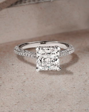 The Ecksand Solitaire Diamond Ring with pave band