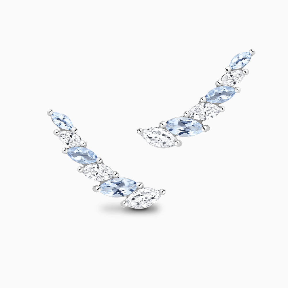 The Ecksand Asymmetrical Diamond and Aquamarine Crawler Earrings shown with Natural VS2+/ F+ in 18k White Gold