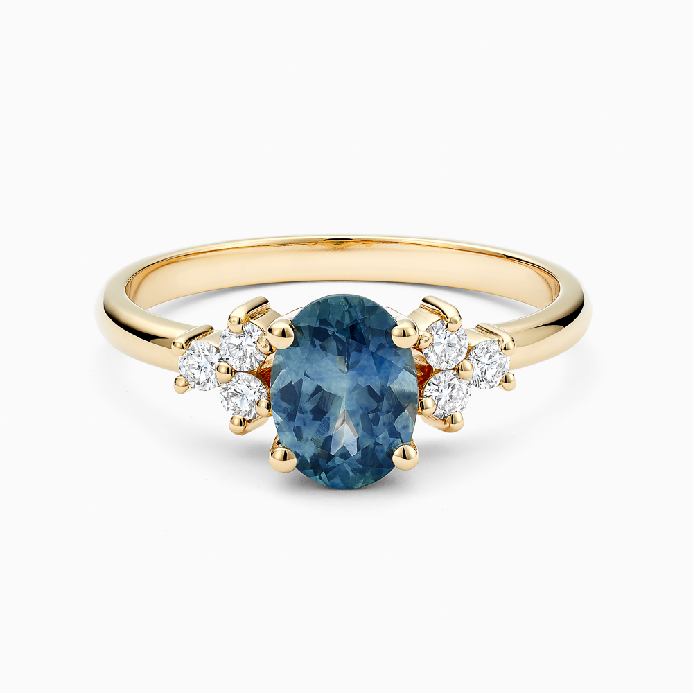 The Ecksand Blue Sapphire Engagement Ring with Six Side Diamonds shown with Natural VS2+/ F+ in 18k Yellow Gold