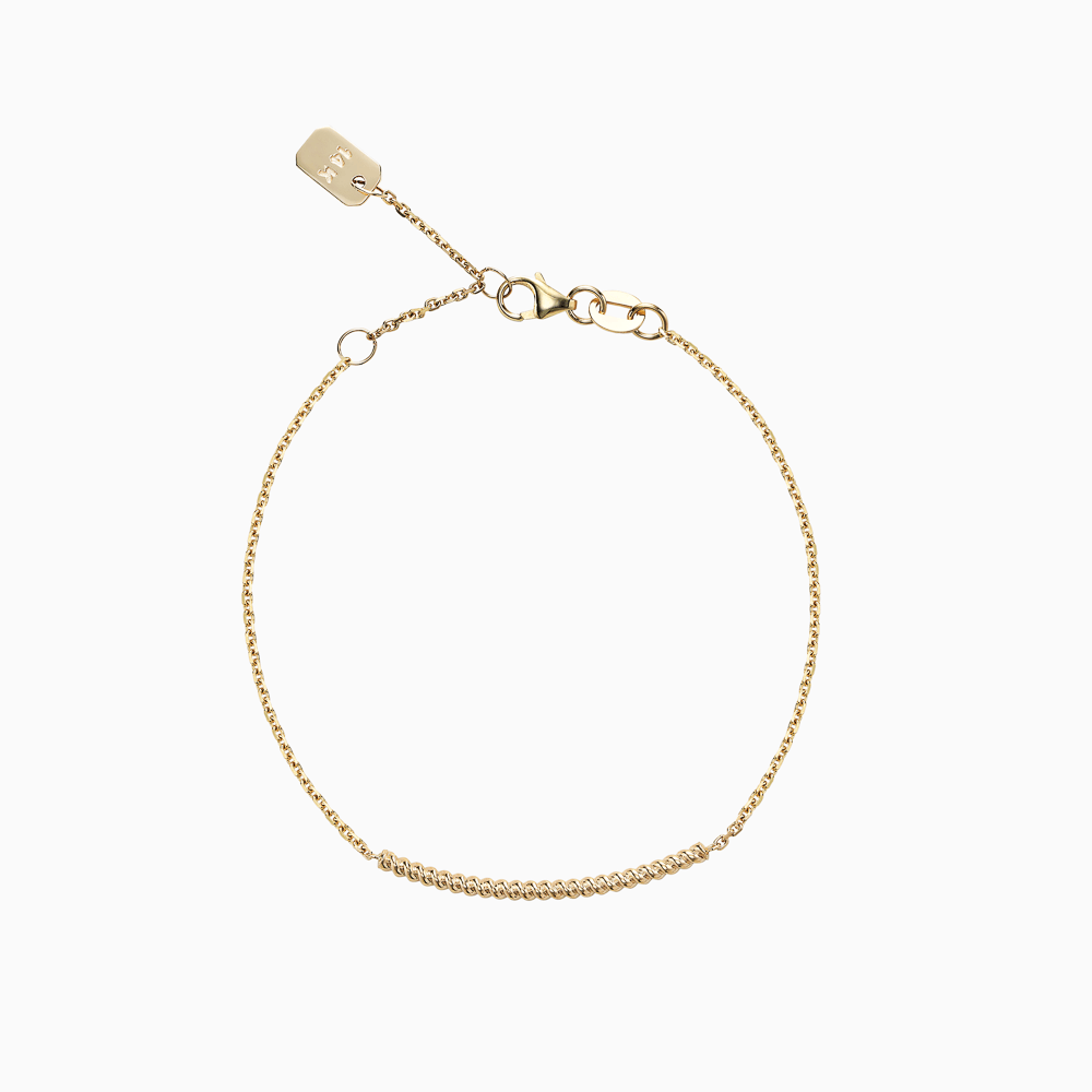 The Ecksand Twisted Gold Bar Bracelet shown with  in 14k Yellow Gold