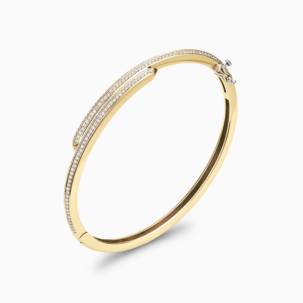The Ecksand Double Diamond Pavé Wrap Bangle shown with Natural VS2+/ F+ in 18k Yellow Gold