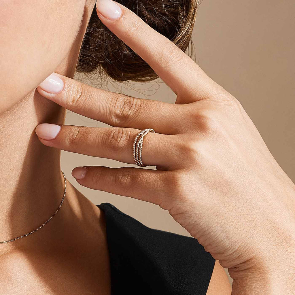 The Ecksand Intertwined Twisted Gold Ring shown with  in 