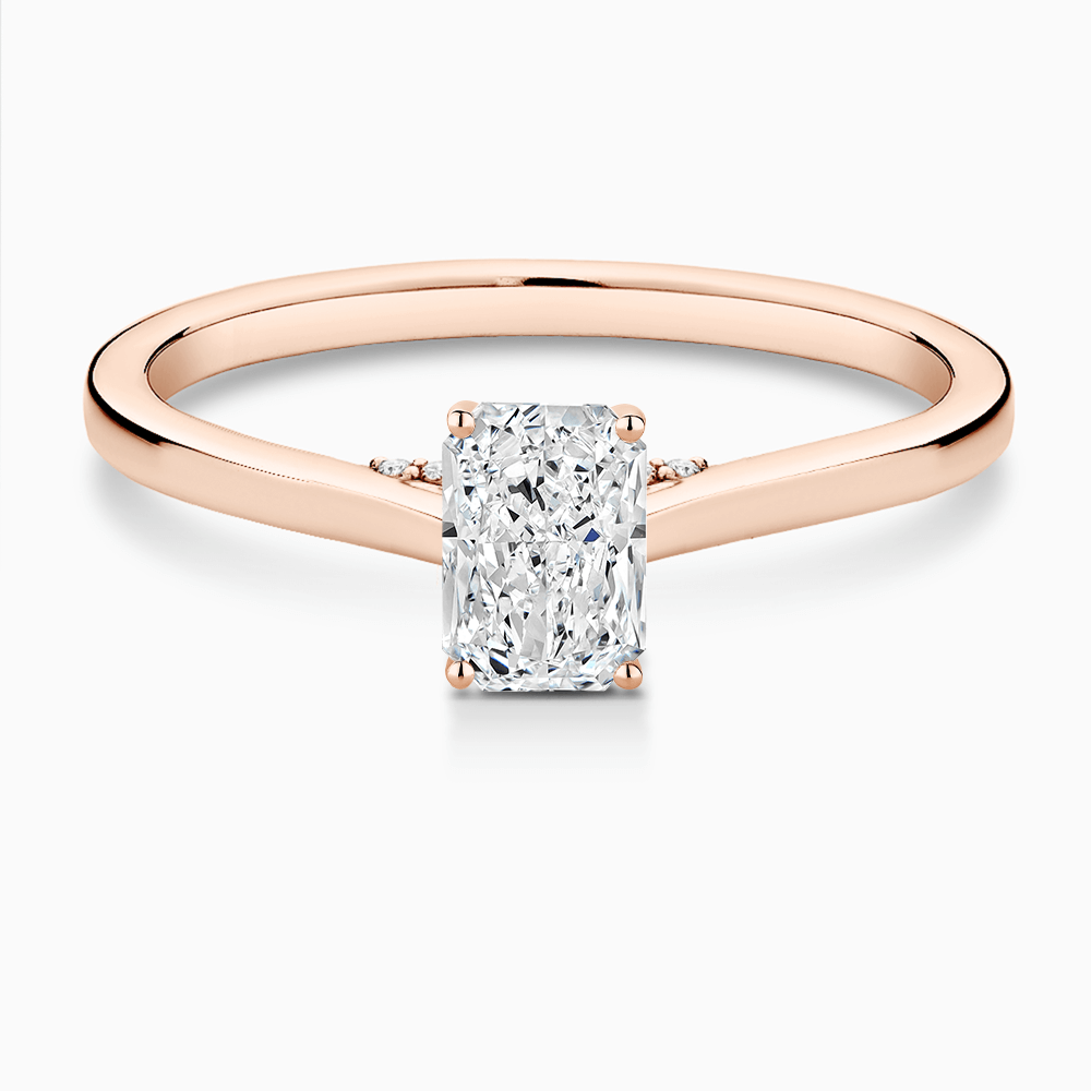 The Ecksand Solitaire Engagement Ring with Diamond Pavé Bridge and Hidden Diamond shown with Radiant in 14k Rose Gold