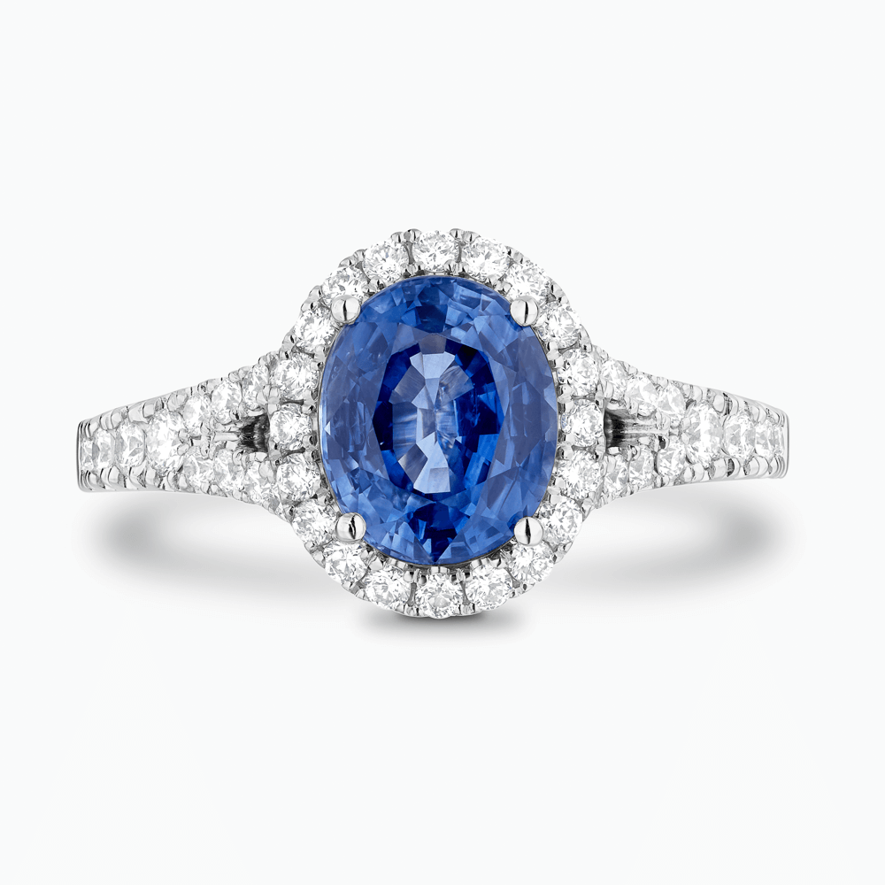 The Ecksand Split Shank Blue Sapphire Engagement Ring with Diamond Halo shown with  in 18k White Gold