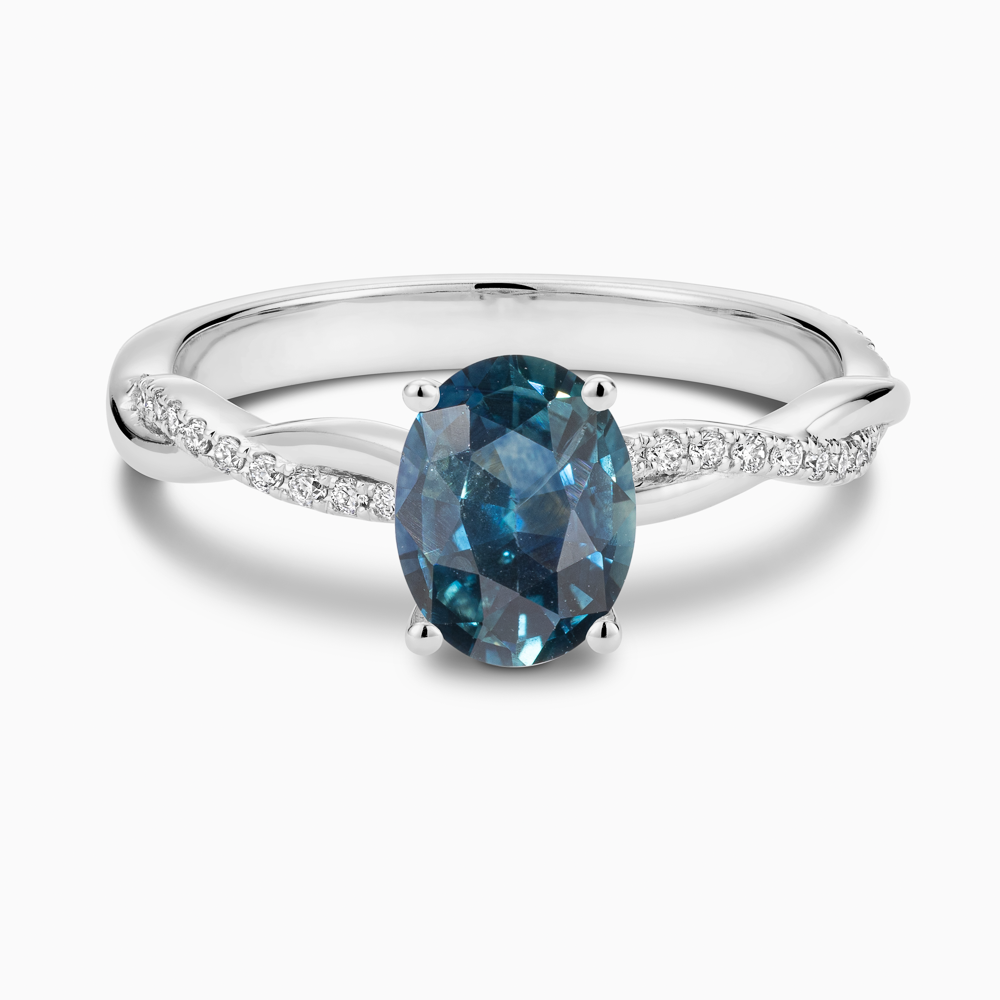 The Ecksand Blue Sapphire Engagement Ring with Secret Heart and Twisted Diamond Band shown with  in Platinum