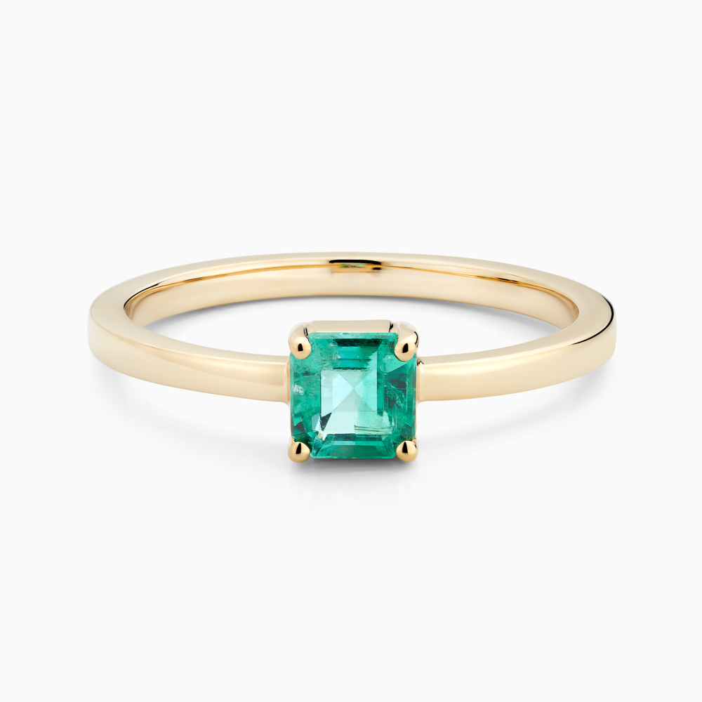 The Ecksand Solitare Emerald Engagement Ring shown with  in 18k Yellow Gold