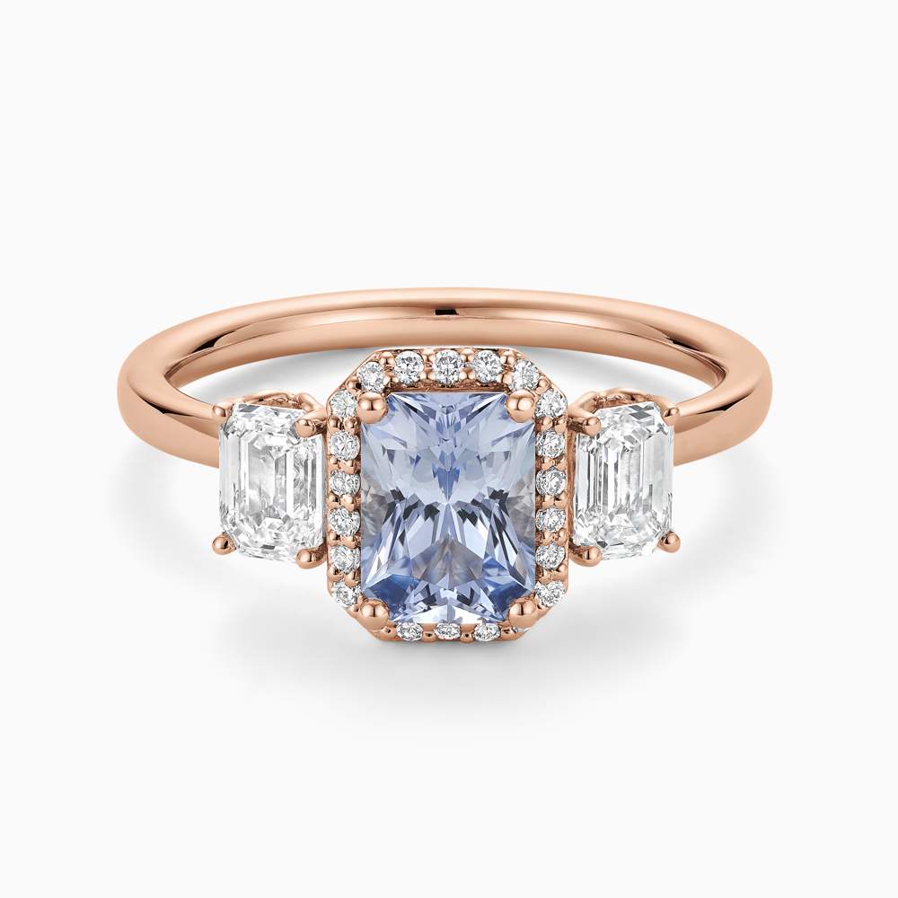 The Ecksand Three-Stone Diamond Engagement Ring with Centre Blue Sapphire shown with  in 14k Rose Gold