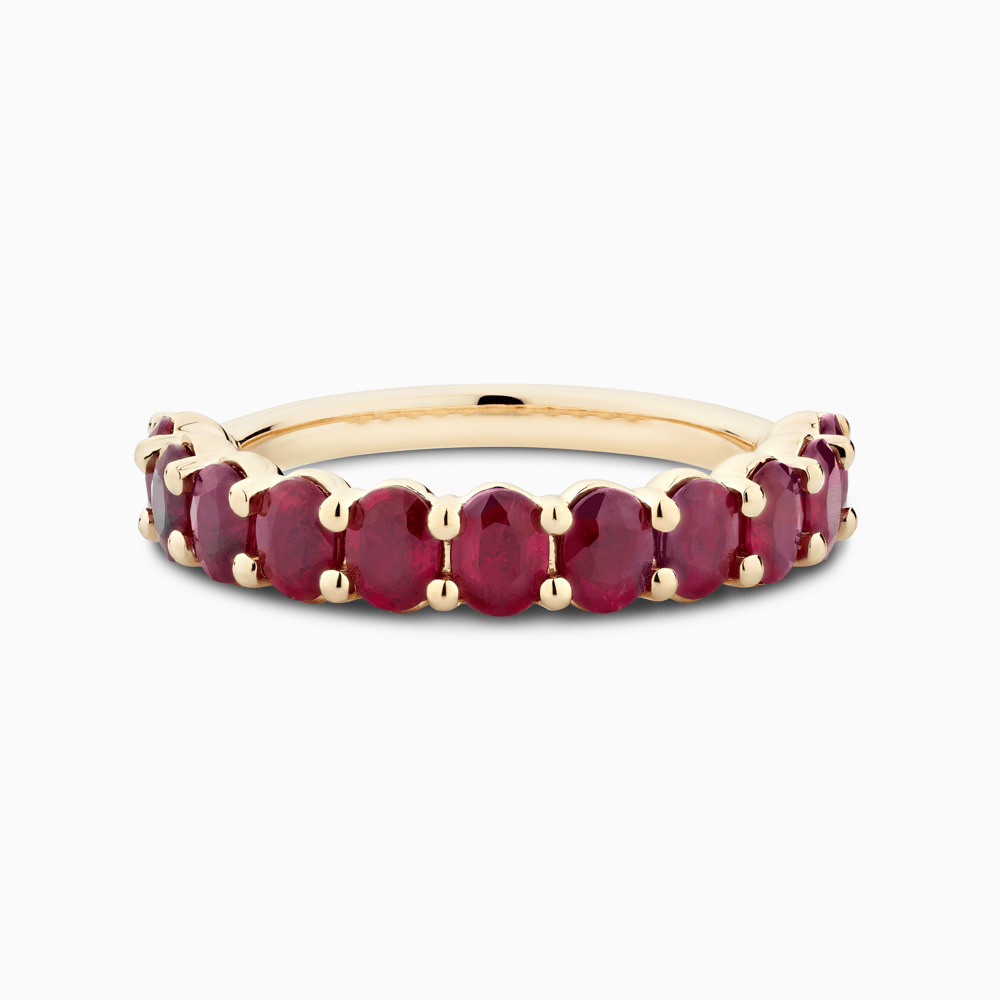 The Ecksand Oval Ruby Semi-Eternity Ring shown with  in 18k Yellow Gold
