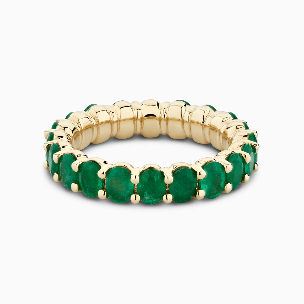 The Ecksand Oval Emerald Eternity Ring shown with  in 18k Yellow Gold