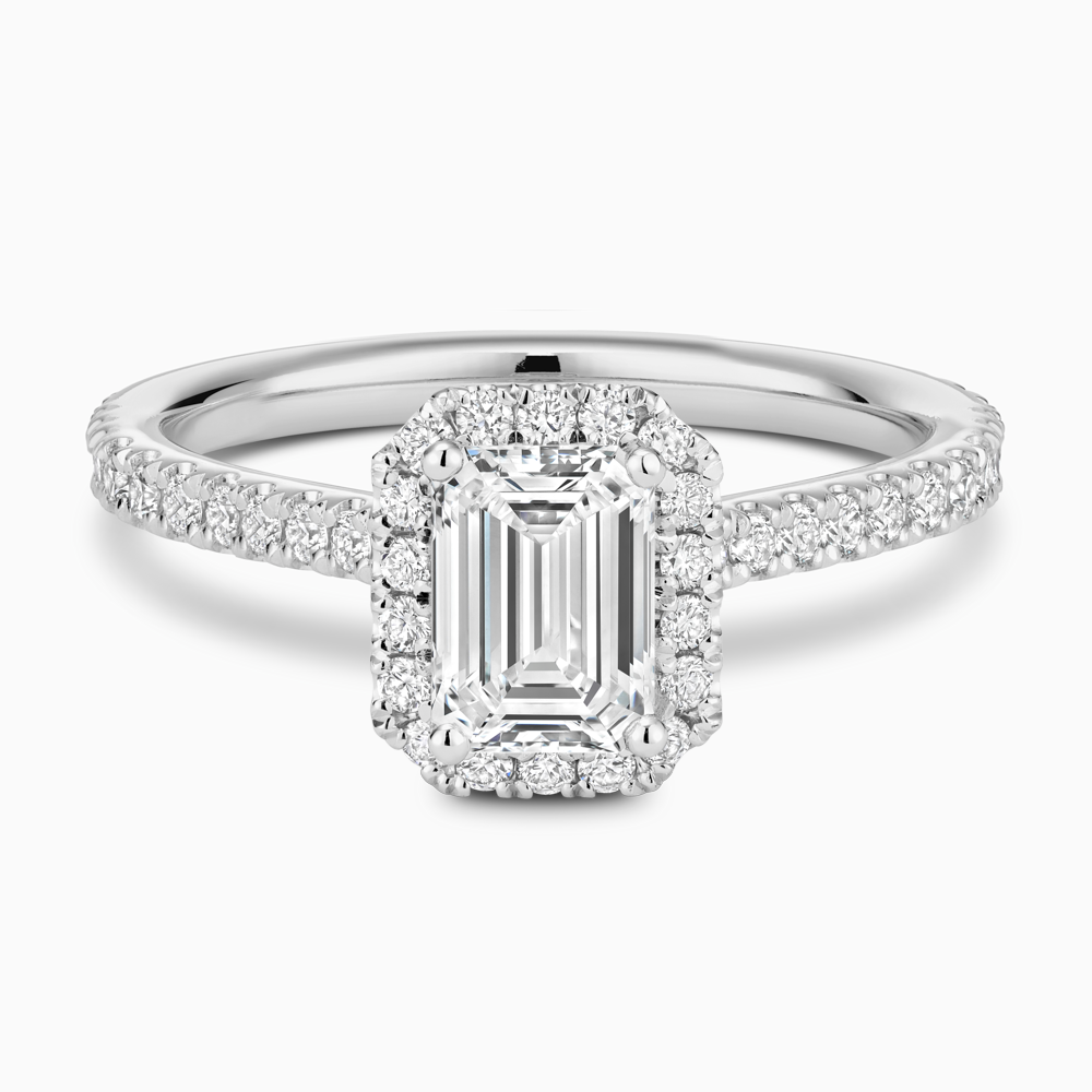 The Ecksand Iconic Diamond Engagement Ring with Halo and Diamond Pavé shown with Emerald in 18k White Gold