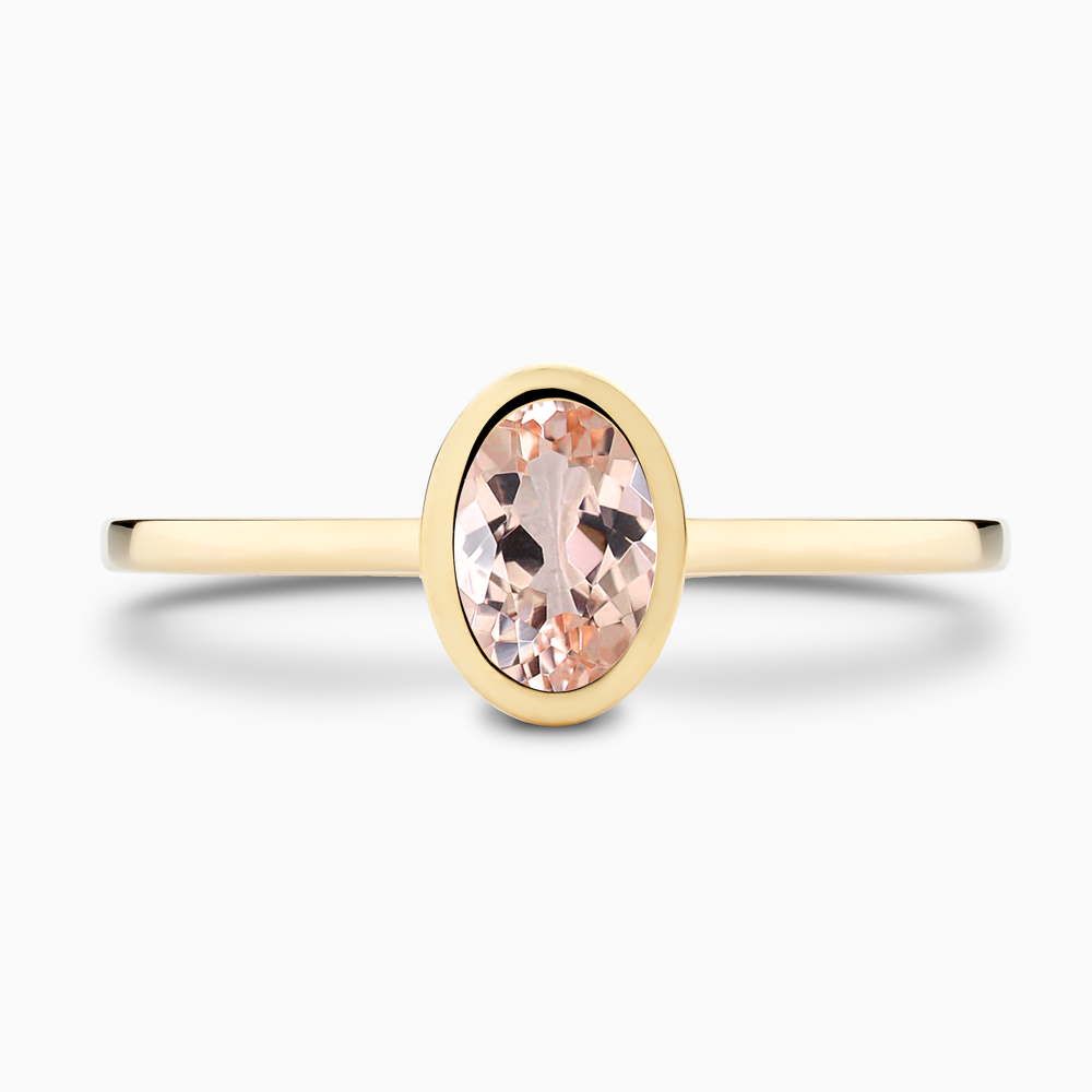 The Ecksand Oval-Cut Morganite Stackable Ring shown with  in 18k Yellow Gold