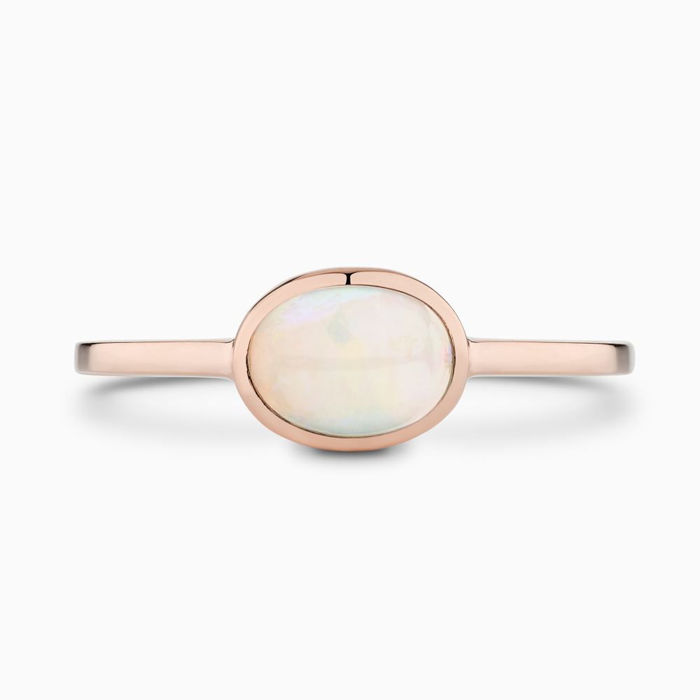 The Ecksand Oval-Cut Opal Stackable Ring shown with  in 14k Rose Gold