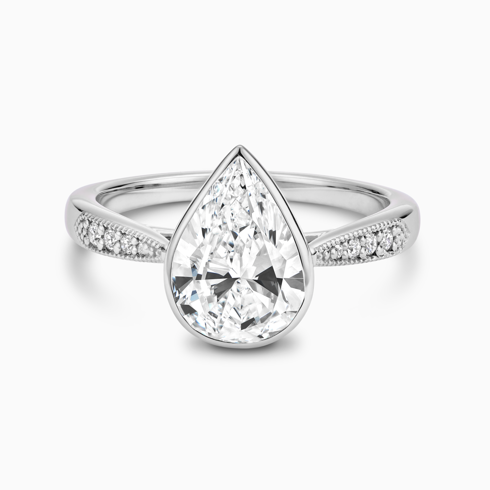 The Ecksand Diamond Engagement Ring With Milgrain Details and Vintage Basket shown with Pear in Platinum