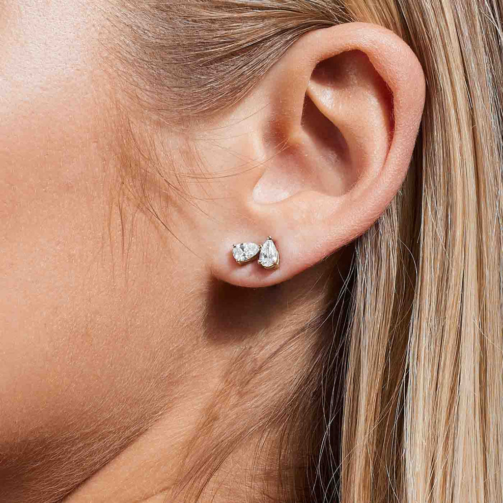 The Ecksand Two-Stone Pear-Cut Diamond Stud Earrings shown with  in 