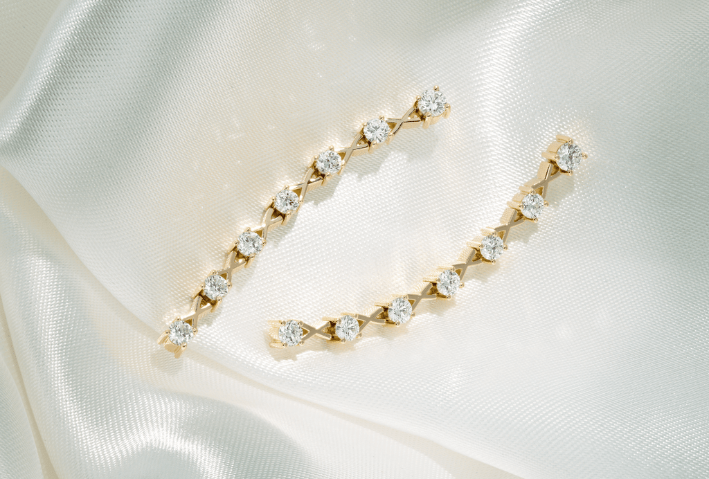 ecksand Interlocking X’s Diamond Dangle Earrings in 18k yellow gold