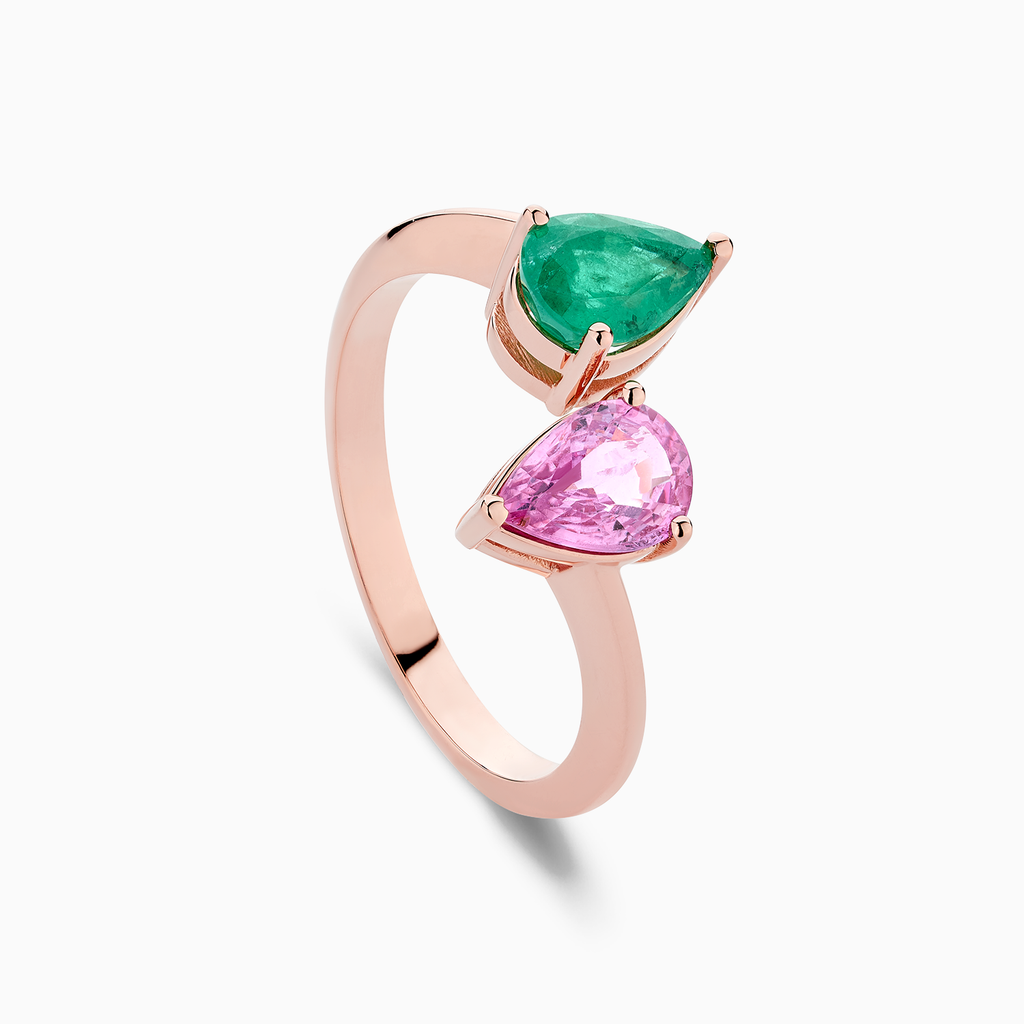 The Ecksand Two-Stone Pear-Cut Pink Sapphire and Emerald Ring shown with  in 