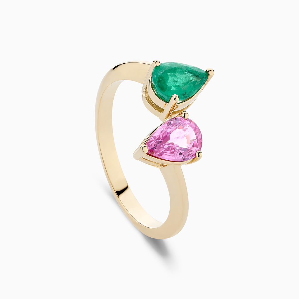 The Ecksand Two-Stone Pear-Cut Pink Sapphire and Emerald Ring shown with  in 