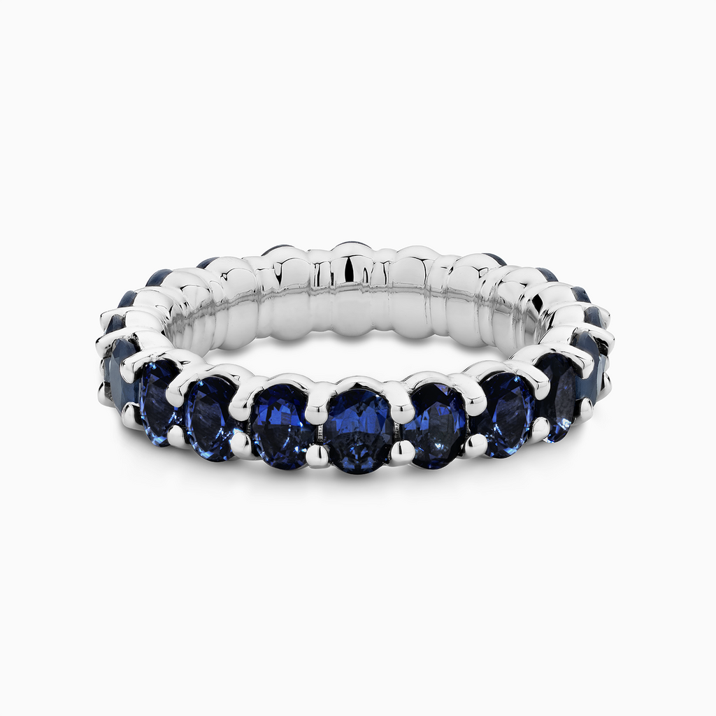 The Ecksand Blue Sapphire Eternity Ring shown with  in 18k White Gold