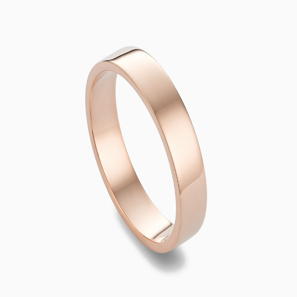 The Ecksand Thin Flat Mirror-Finish Wedding Ring shown with  in 