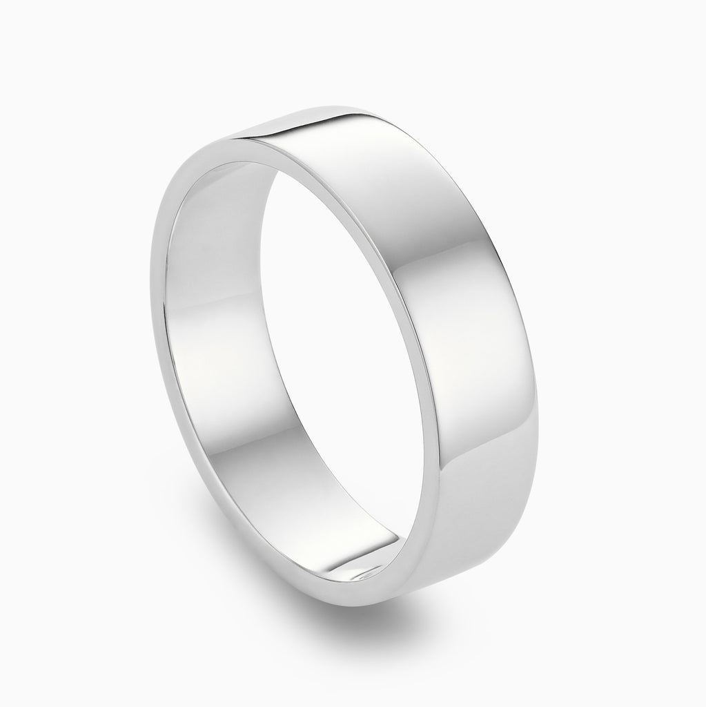 The Ecksand Thick Flat Mirror-Finish Wedding Ring shown with  in 