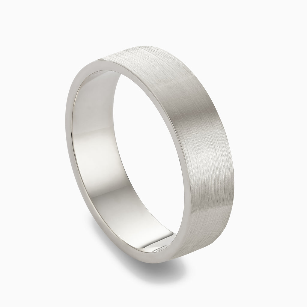 The Ecksand Thick Flat Brushed Wedding Ring shown with  in 