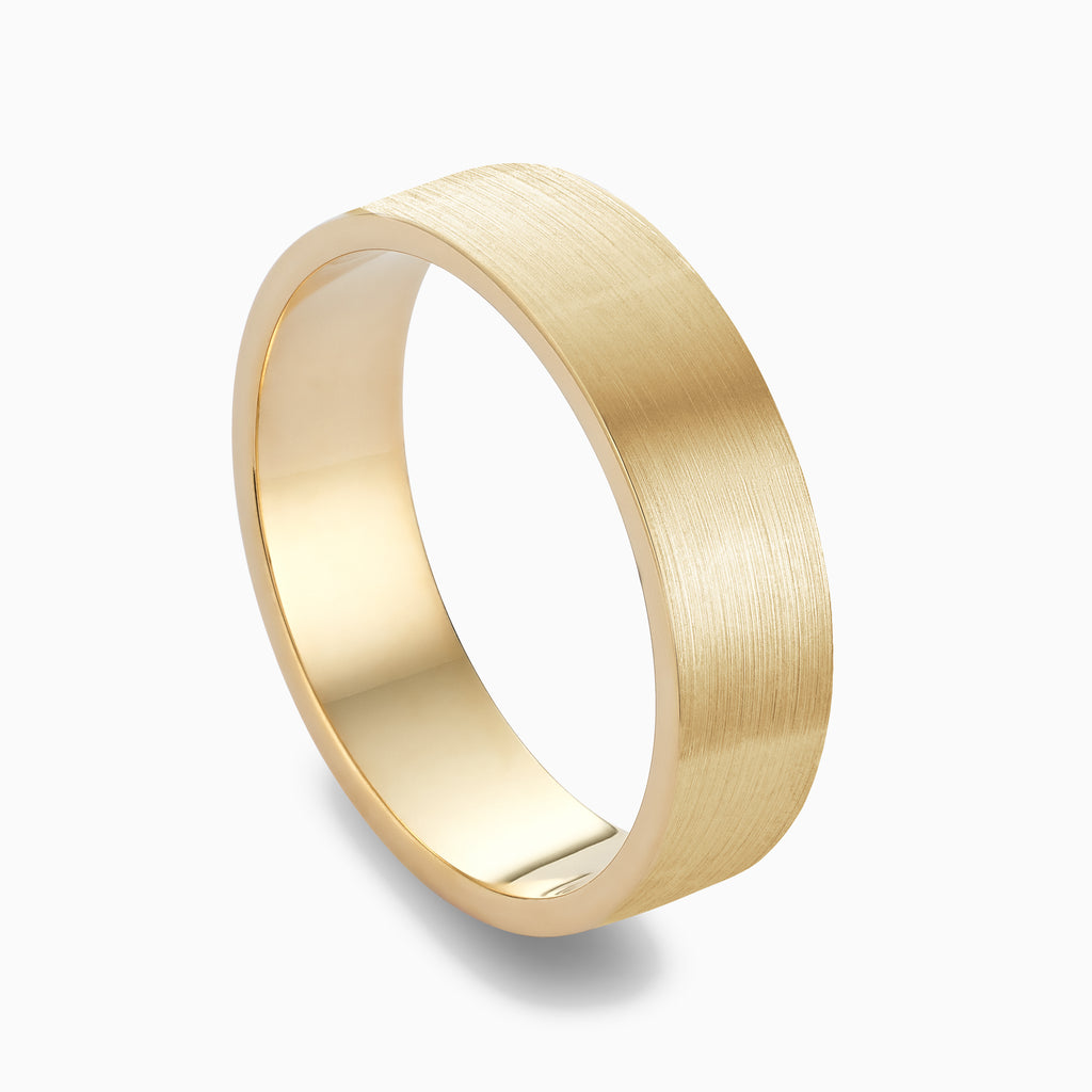 The Ecksand Thick Flat Brushed Wedding Ring shown with  in 