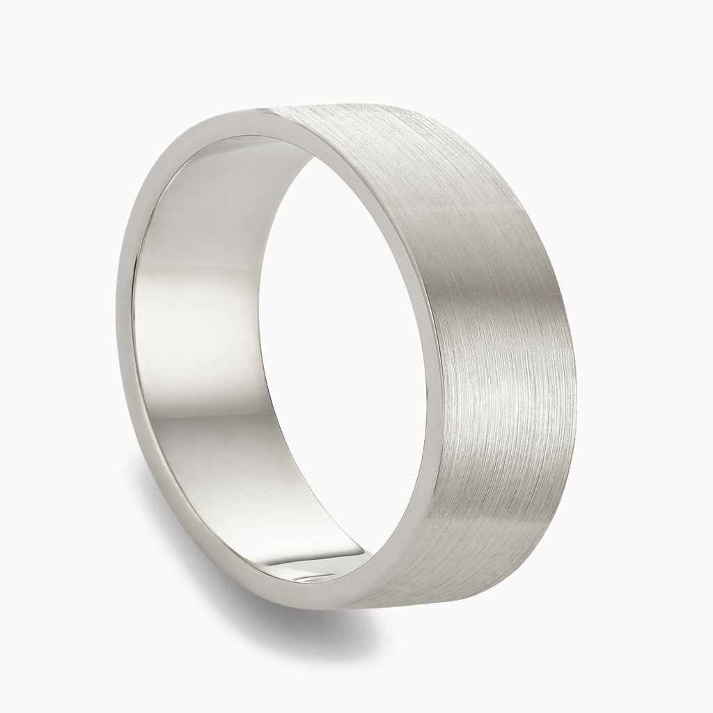 The Ecksand Thick Flat Brushed Wedding Ring shown with  in 