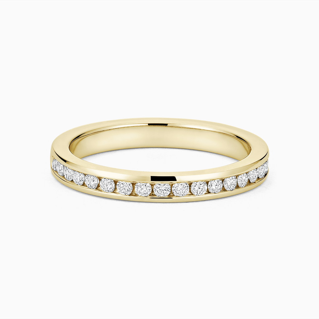 Angled view of Ecksand's Channel-Set Diamond Wedding Ring in 18k Yellow Gold, Lab-grown VS2+/ F+