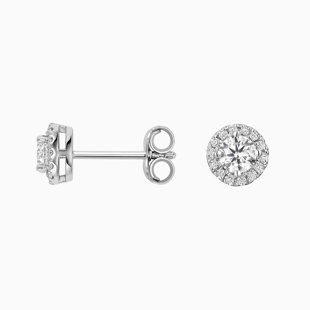 Angled view of Ecksand's Diamond Halo Stud Earrings in Platinum, Natural VS2+/ F+ #2