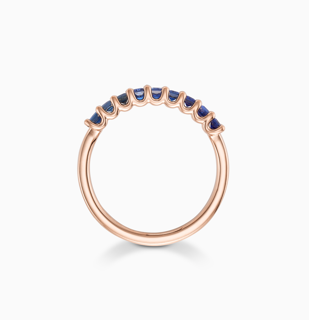 Angled view of Ecksand's Baguette-Cut Blue Sapphire Ring in 14k Rose Gold #2