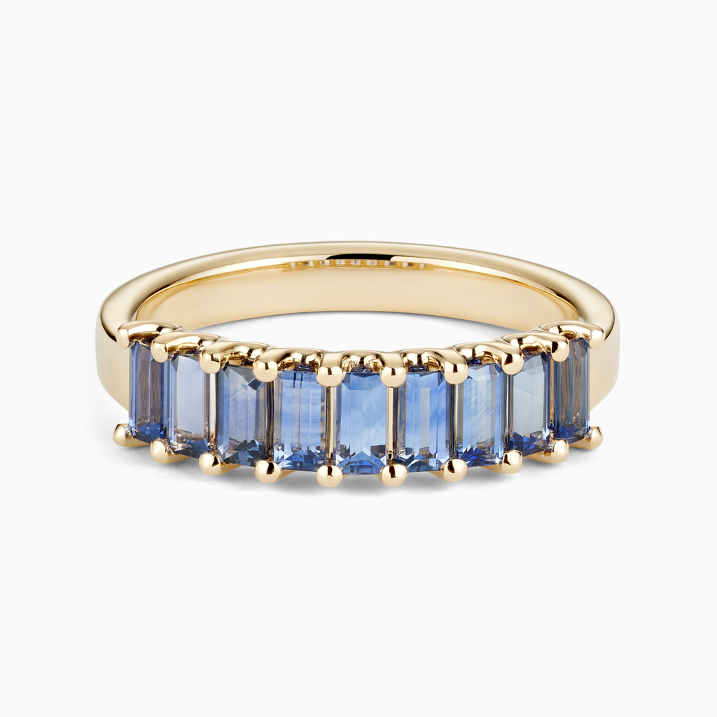 Face view of ecksand's baguette-cut blue sapphire ring