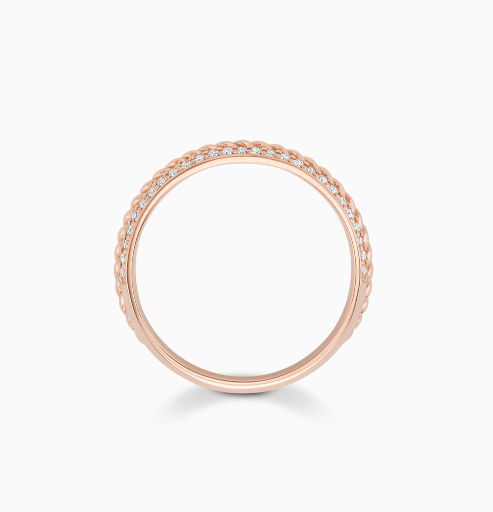 The Ecksand Twisted Gold Ring with Diamond Pavé shown with  in 