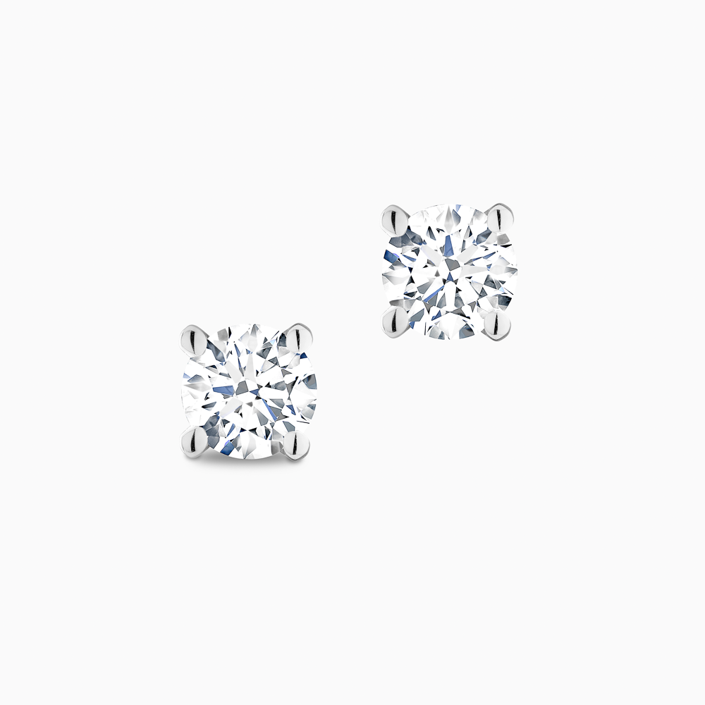 The Ecksand Four-Prong Diamond Stud Earrings shown with  in 