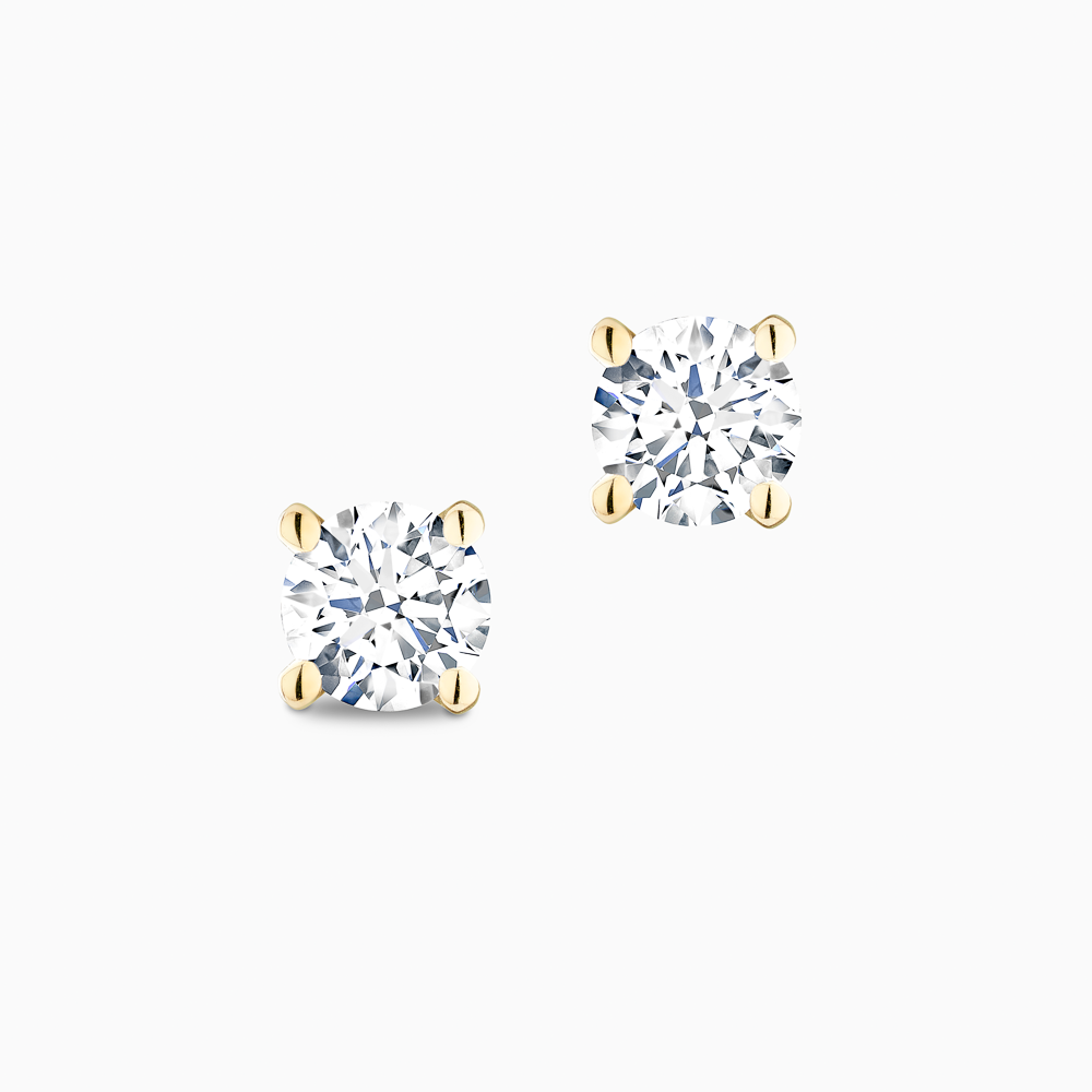 The Ecksand Four-Prong Diamond Stud Earrings shown with Natural 0.50ctw VS2+/F+ in 14k Yellow Gold