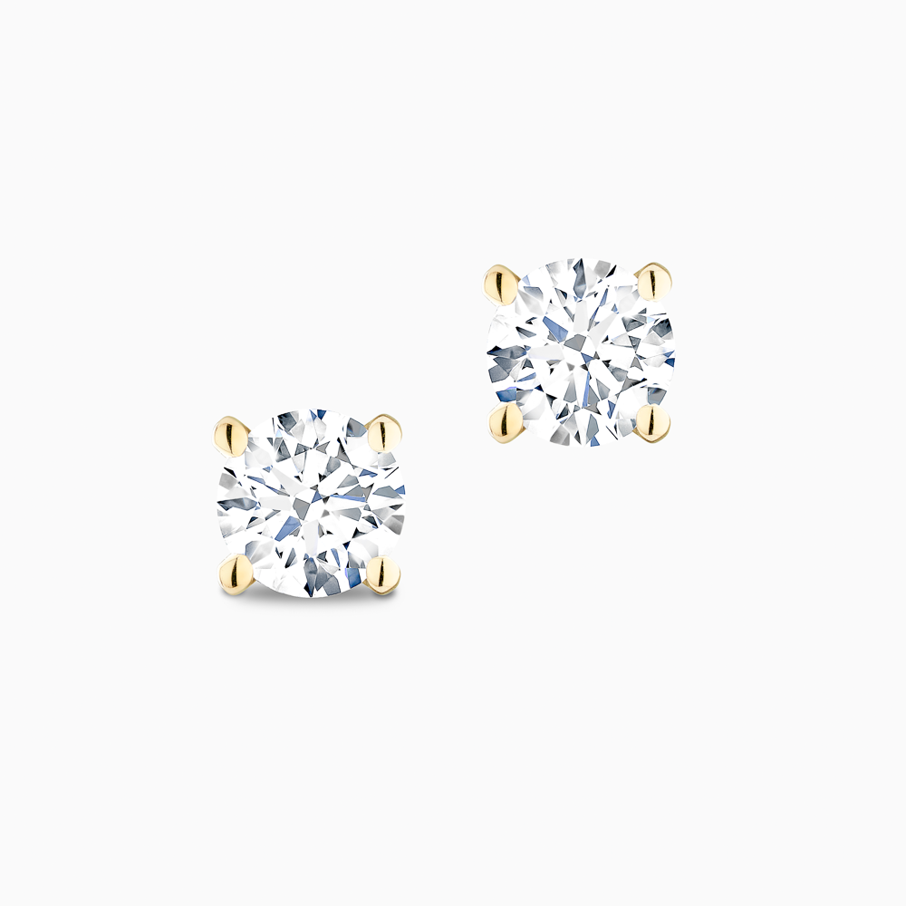 The Ecksand Four-Prong Diamond Stud Earrings shown with Natural 0.60ctw VS2+/H+ in 14k Yellow Gold