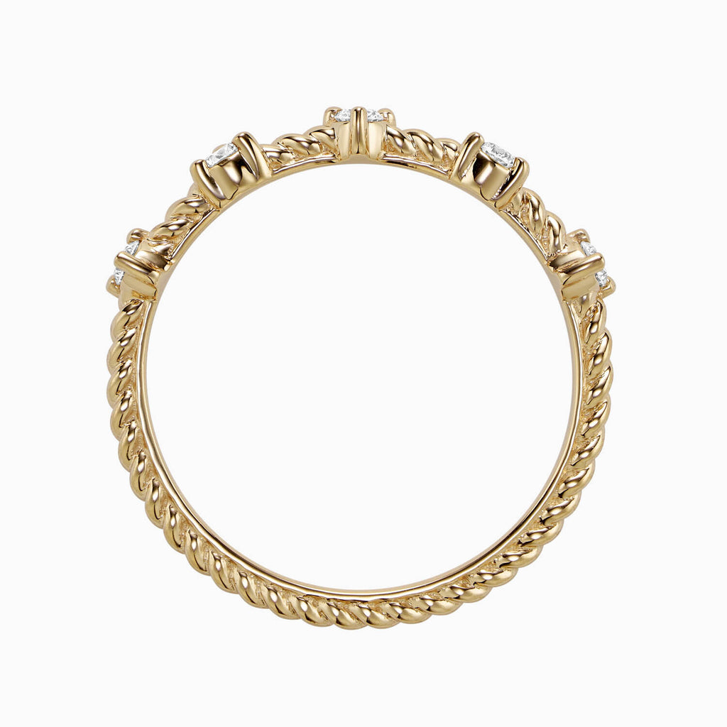 The Ecksand Twisted Gold Ring with Accent Diamonds shown with  in 