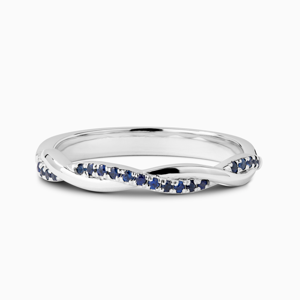 The Ecksand Twisted Wedding Ring with Accent Blue Sapphires shown with  in Platinum