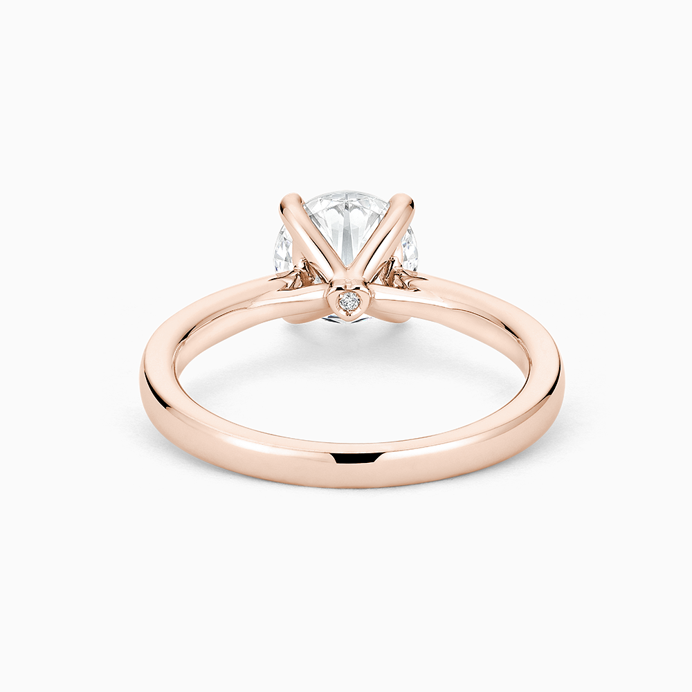 The Ecksand Love-Knot Solitaire Diamond Engagement Ring with Eagle Prongs shown with  in 