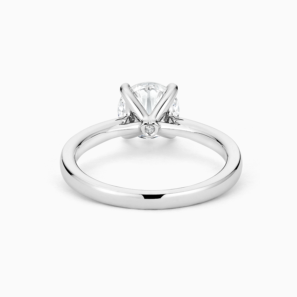 The Ecksand Love-Knot Solitaire Diamond Engagement Ring with Eagle Prongs shown with  in 