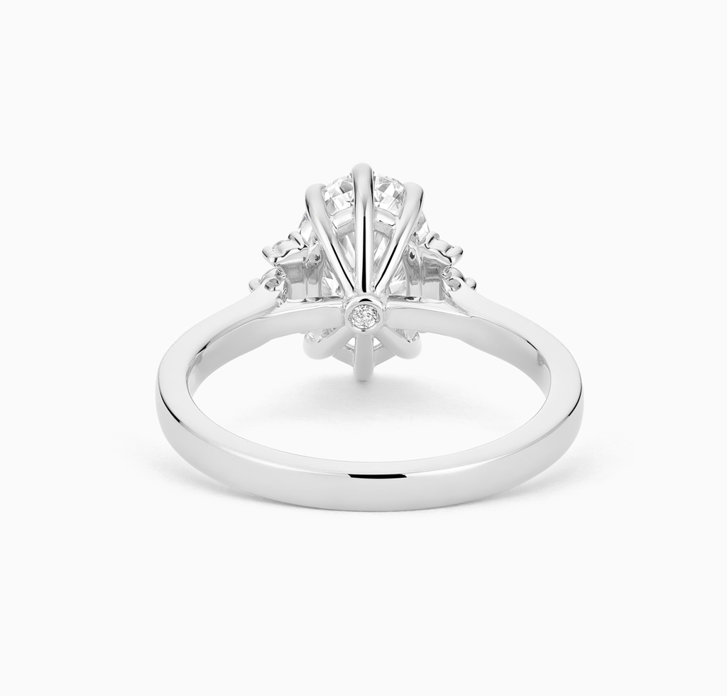 The Ecksand Solitaire Six-Prongs Engagement Ring with Diamond Accent Pavé shown with  in 