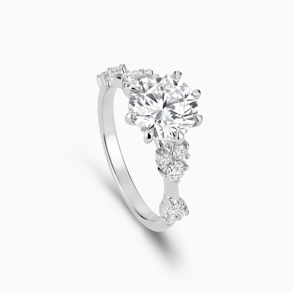 The Ecksand Eight-Prong Blossom Engagement Ring with Side Diamonds shown with  in 