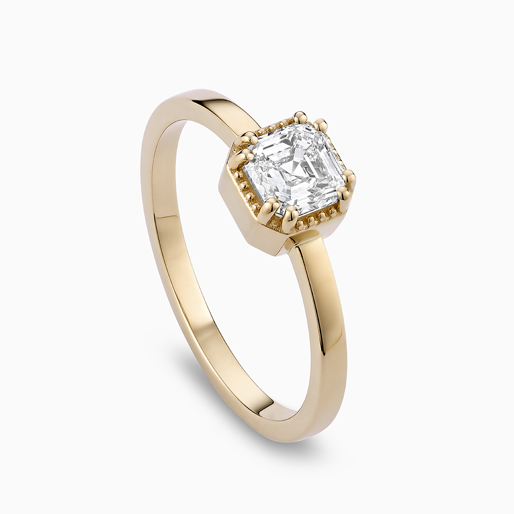 Angled view of Ecksand's Asscher Diamond Stackable Ring with Milgrain Halo in 18k Yellow Gold, Lab-grown VS2+/F+