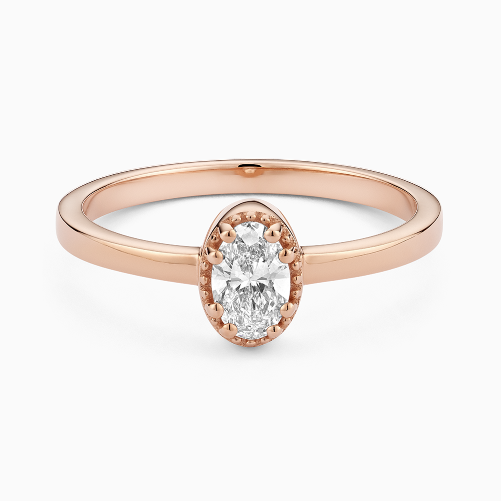 Face view of Ecksand's Oval Diamond Stackable Ring with Milgrain Halo in 18k Rose Gold, Lab-grown VS2+/F+