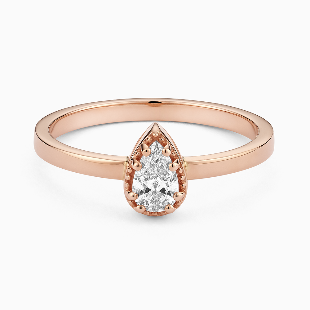 Face view of Ecksand's Pear Diamond Stackable Ring with Milgrain Halo in 18k Rose Gold, Lab-grown VS2+/F+