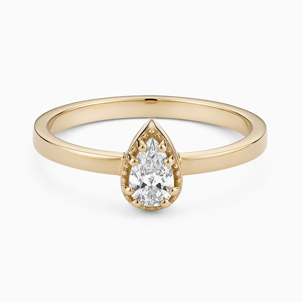 Face view of Ecksand's Pear Diamond Stackable Ring with Milgrain Halo in 18k Yellow Gold, Lab-grown VS2+/F+