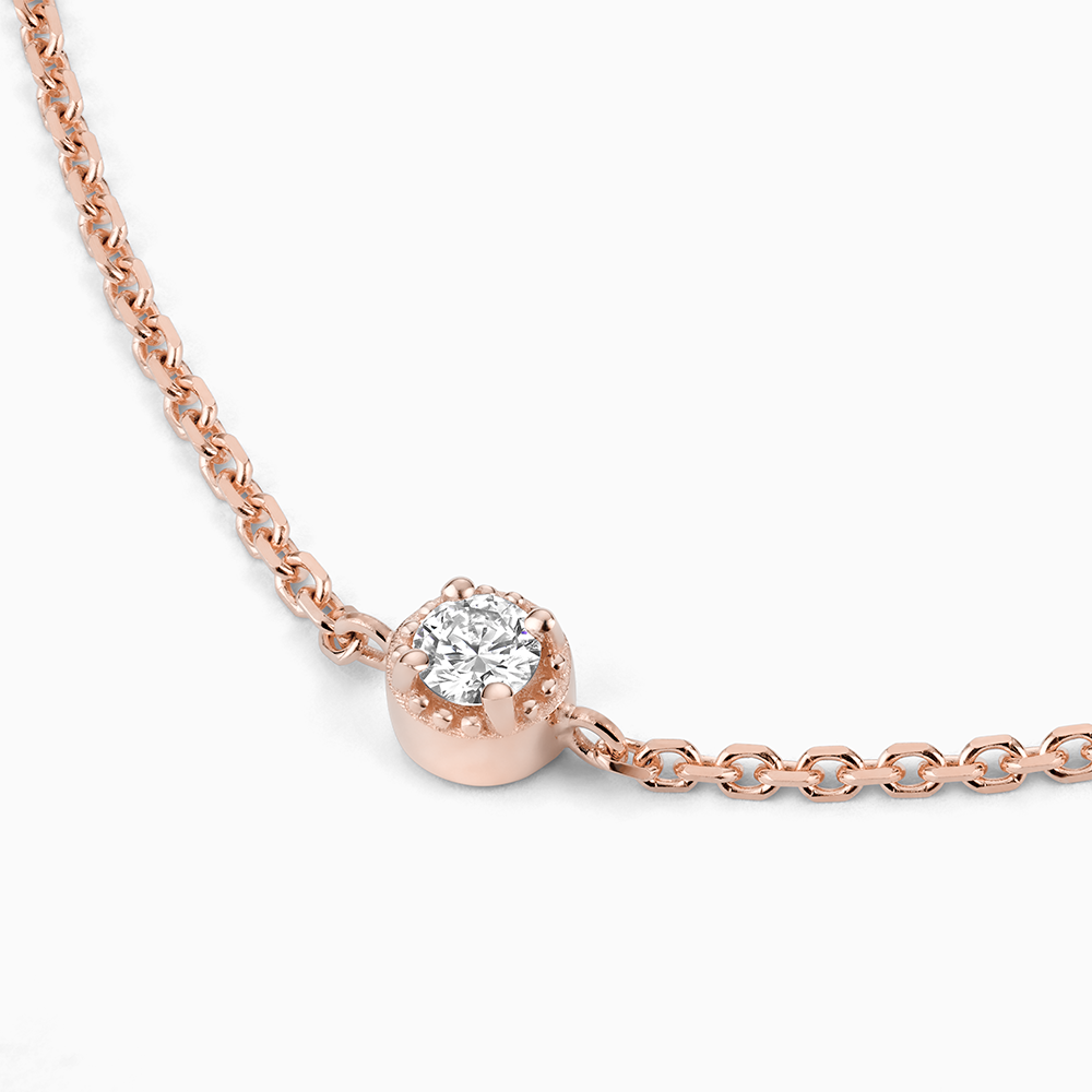 Angled view of Ecksand's Round Diamond Stackable Bracelet with Milgrain Halo in 18k Rose Gold, Lab-grown VS2+/F+